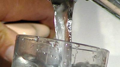 Generic image of water flowing from a kitchen tap (file photo).