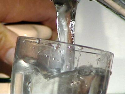 Generic image of water flowing from a kitchen tap (file photo).