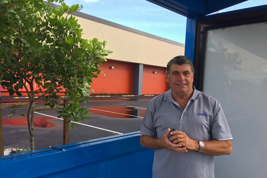 Moreton Bay Council Mayor Allan Sutherland stands in one of the shelters that has been attacked numerous times by vandals.