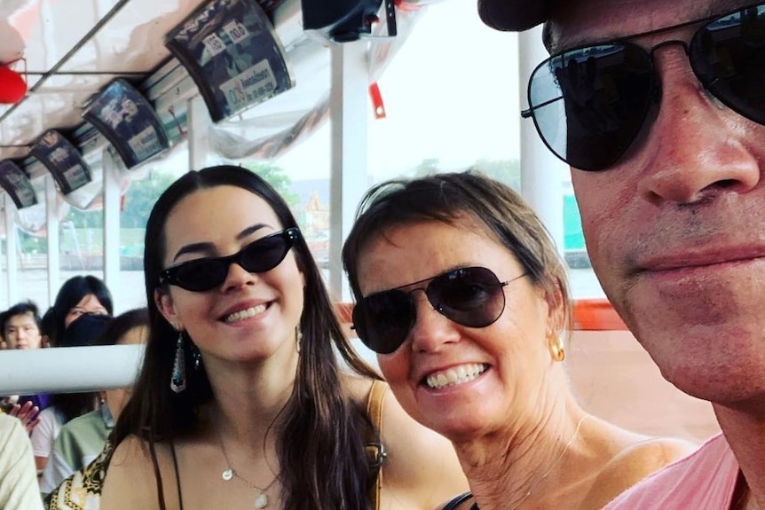 A selfie of the the Radionich family on a ferry in Thailand