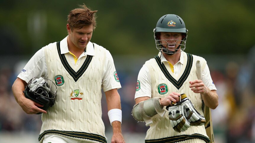 Australia's Shane Watson and Chris Rogers leave the field during the tour match at Worcester.