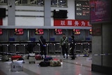 Police at Chinese train station after attack