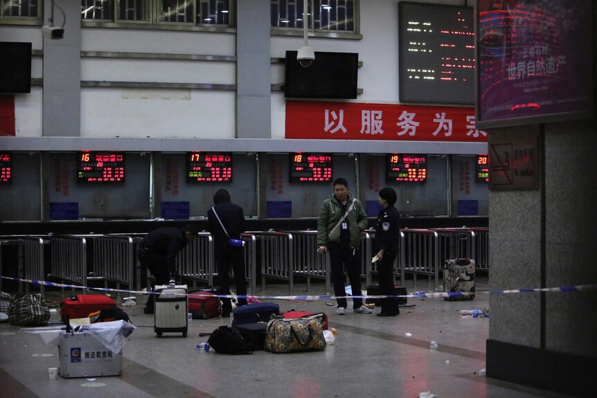 Armed men attack Chinese train station