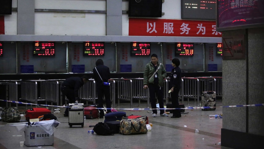 Police at Chinese train station after attack