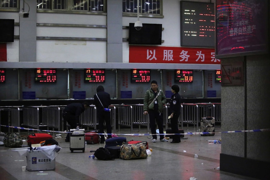 Police at Chinese train station after attack