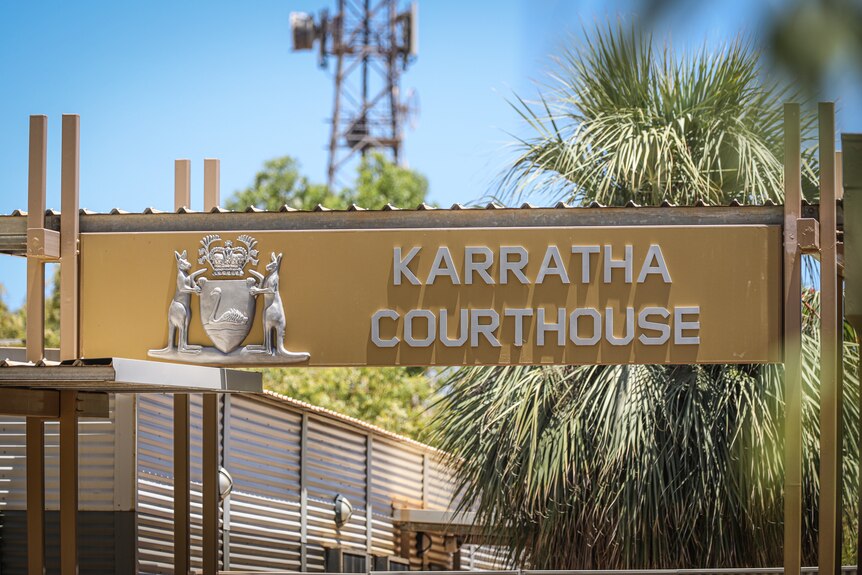 A sign saying 'Karratha Magistrates Court'.