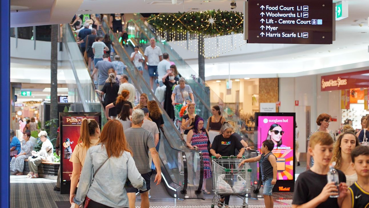 Escalators at Carindale shopping centre busy with Christmas shoppers