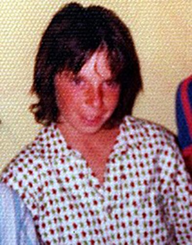 An old photo of a young boy.