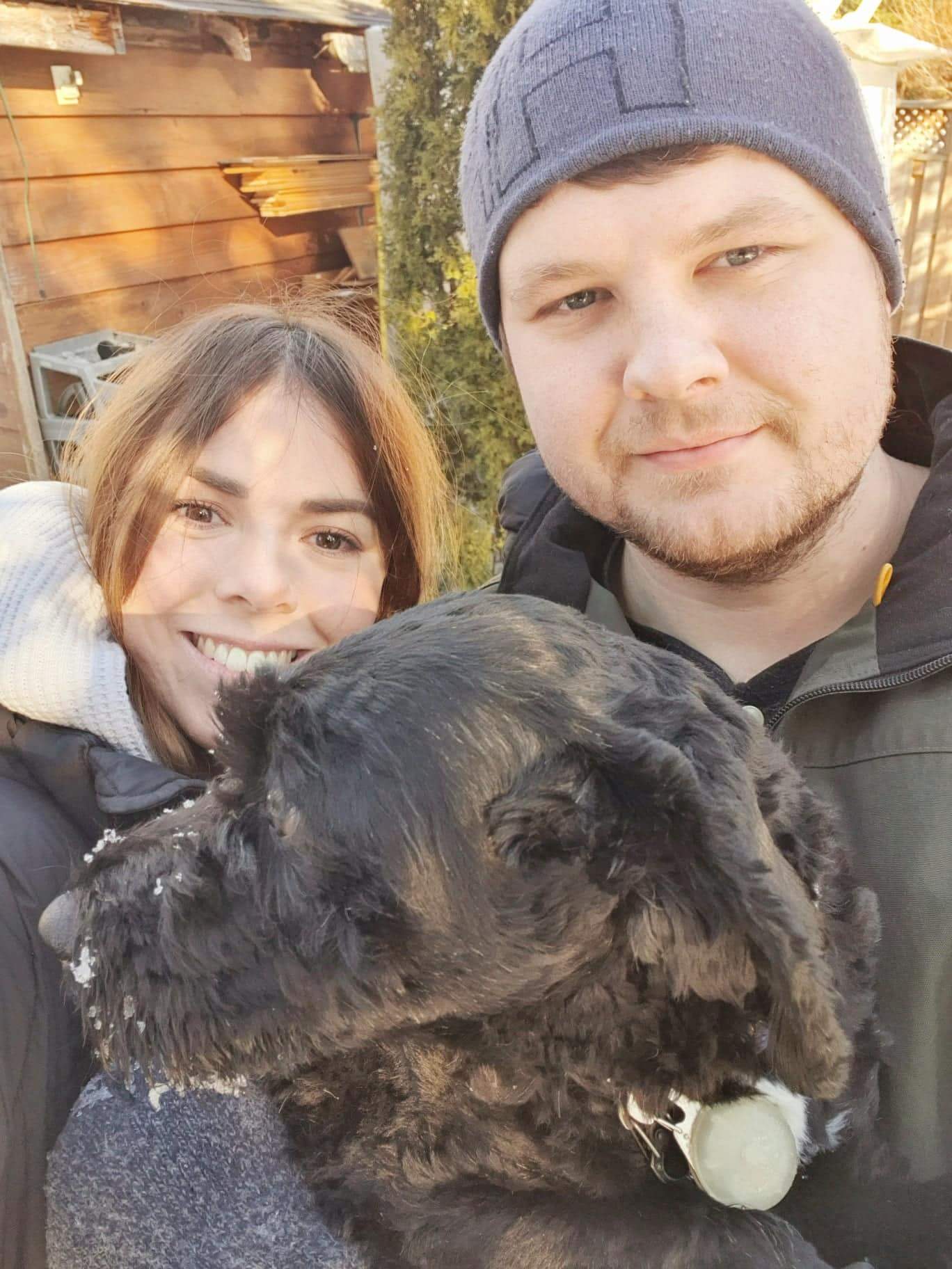 Georgia, her boyfriend and one of their two dogs.
