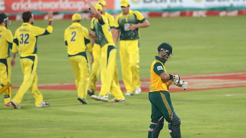 Australian players celebrate the wicket of JP Duminy of South Africa in the third T20 international.