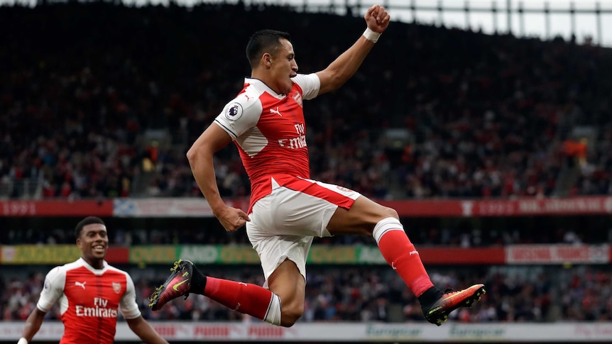 Alexis Sanchez celebrates his goal against Chelsea