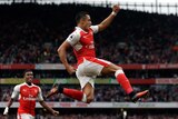 Alexis Sanchez celebrates his goal against Chelsea