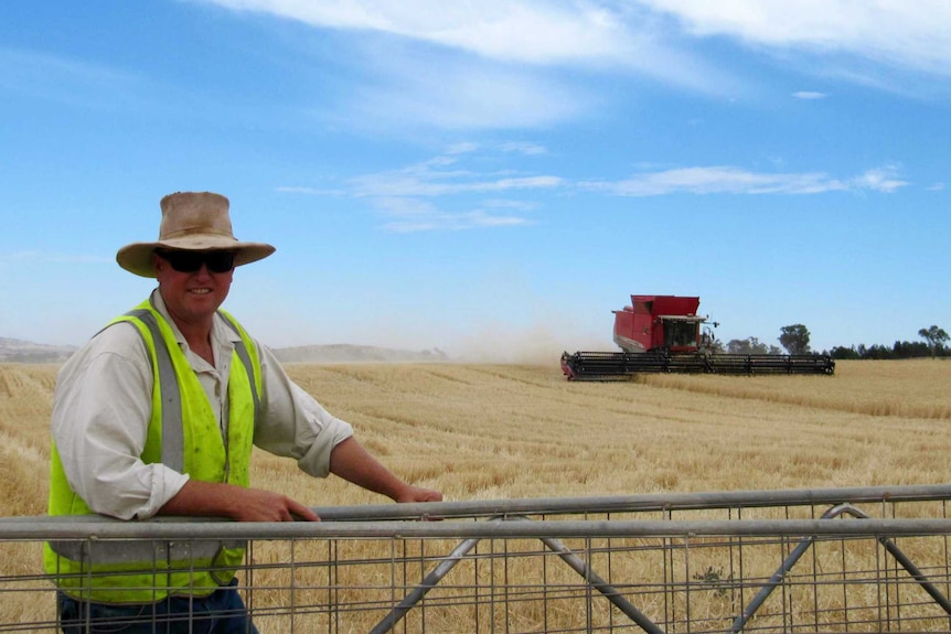 Hassad property manager Rob Atkinson standing at gate of property at Canowindra in NSW.