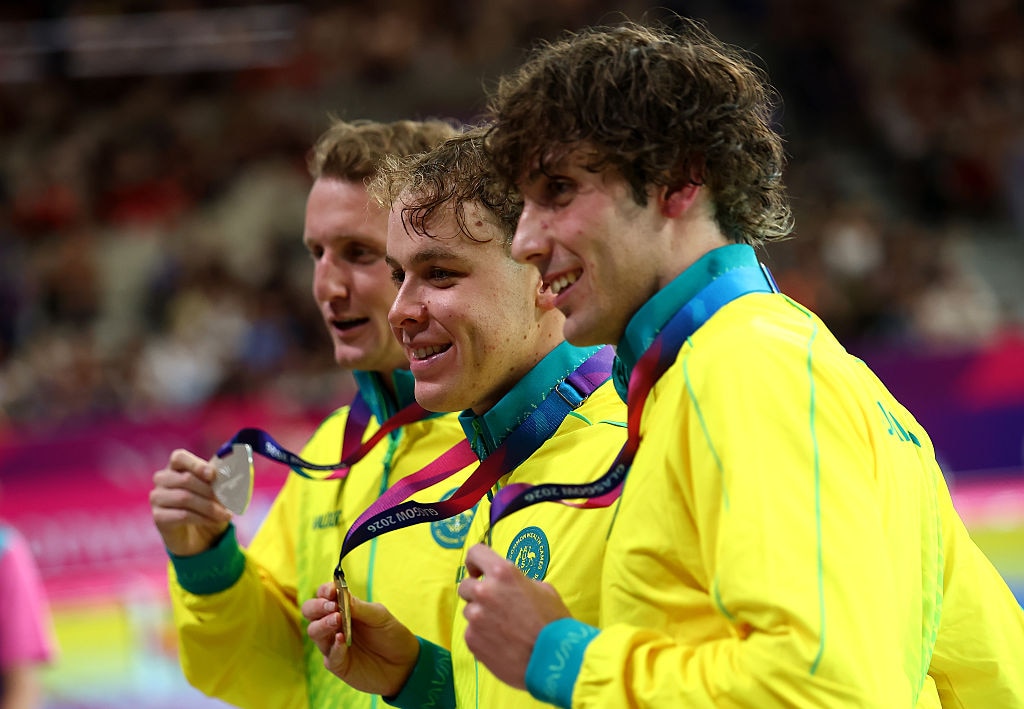 Sam Short, Elijah Winnington and Benjamin Goedemans with medals at the Commonwealth Games