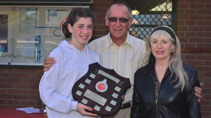 Bali bombing victim's parents present sports shield in honour of their son lost in Bali bombings