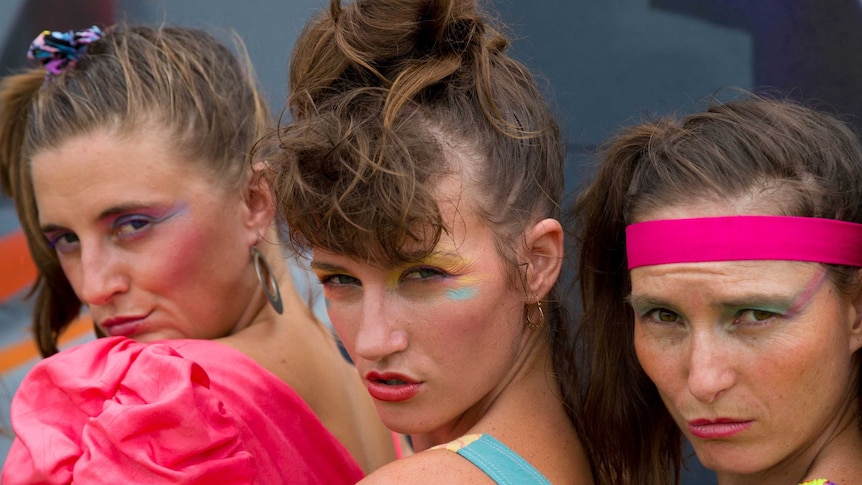 Dancers pout at the camera