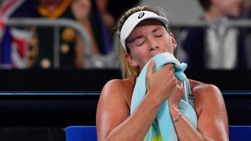 Coco Vandeweghe towels off at the Australian Open
