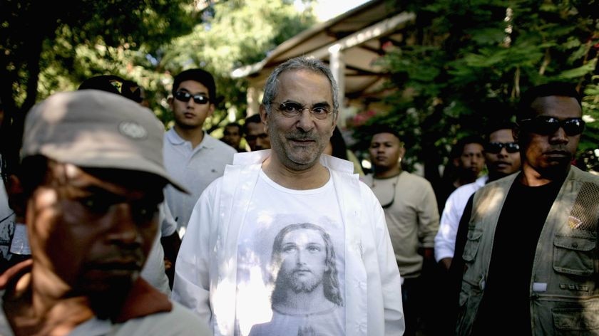 Jose Ramos Horta arrivves at polling station