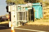 fierce wind storm caused a B-double truck to roll on its side