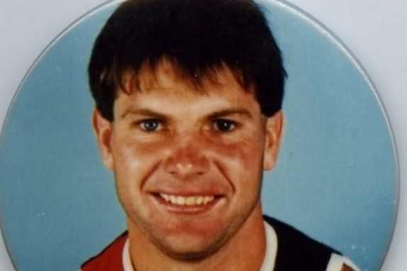 A young Danny Frawley, in a St Kilda guernsey, on a pin.