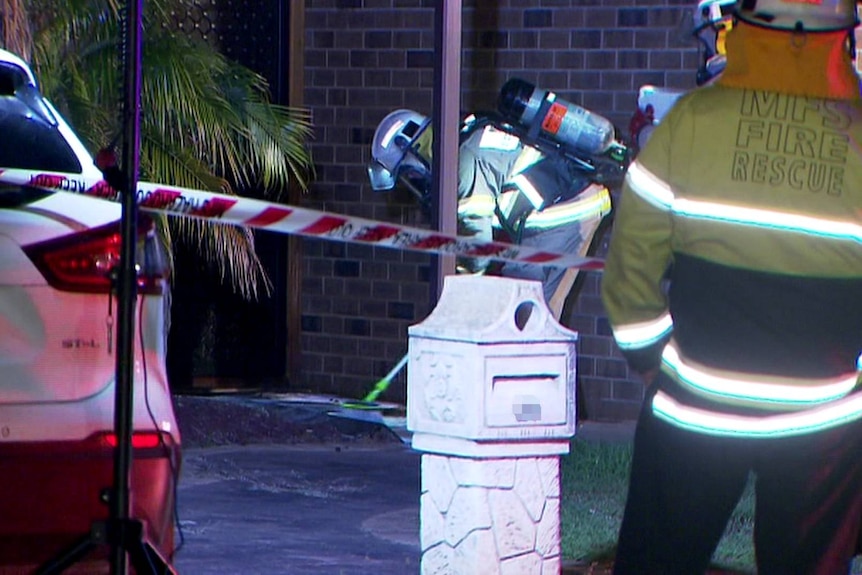Adelaide firefighters at the scene of an acid attack.
