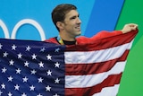 Michael Phelps celebrates winning his 23rd Olympic gold medal
