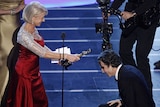 Actor Daniel Day-Lewis accepts the Oscar for best actor