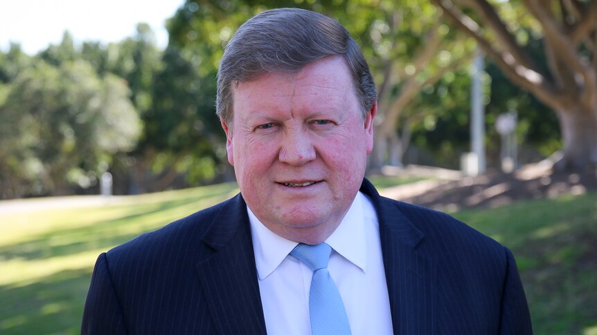 Peter Daly poses for a photograph in a park in Sydney's west.