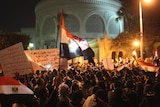 Protesters chant anti-Morsi slogans in front of the presidential palace in Cairo.