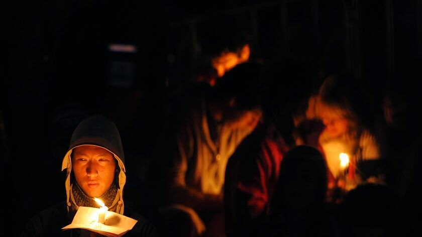 World Youth Day pilgrims hold candlelit vigil