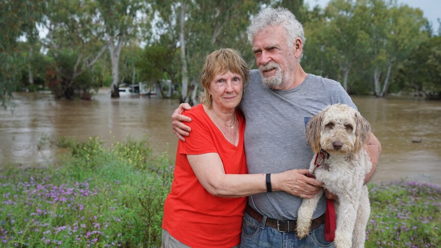 john and jan elliott flood couple with dog 