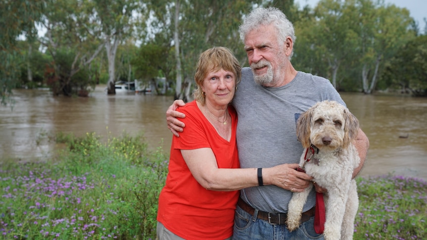 john and jan elliott flood couple with dog 