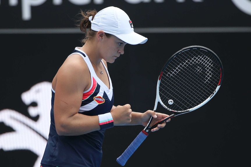 Ash Barty pumps her fist after winning a game in her Sydney International quarter-final.