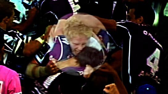 Bulldogs player James Graham appears to bite Storm player Billy Slater.