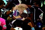 Bulldogs player James Graham appears to bite Storm player Billy Slater.