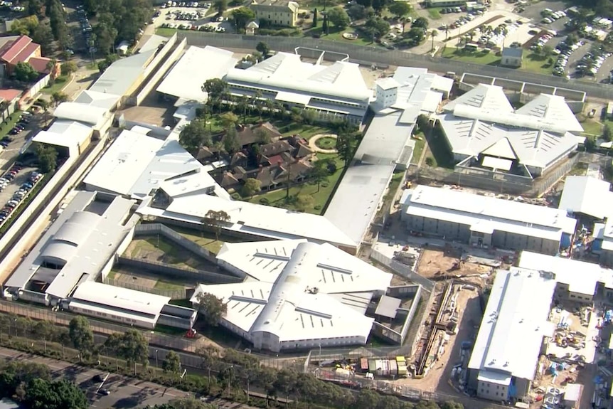 Aerial footage of a corrections centre in a suburban area