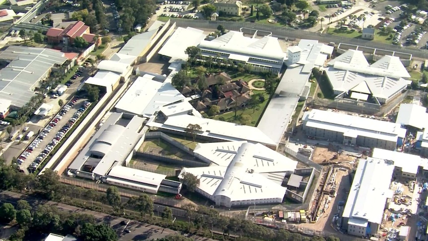 Aerial footage of a corrections centre in a suburban area