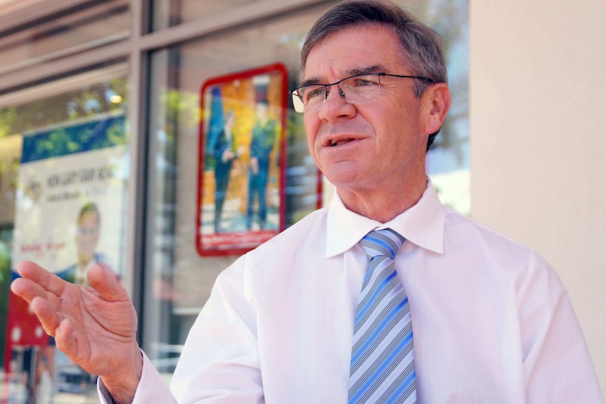 The Member for Brand Gary Gray speaking outside his electorate office in Rockingham