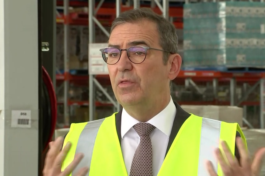 Premier Steven Marshall wearing a high vis vest