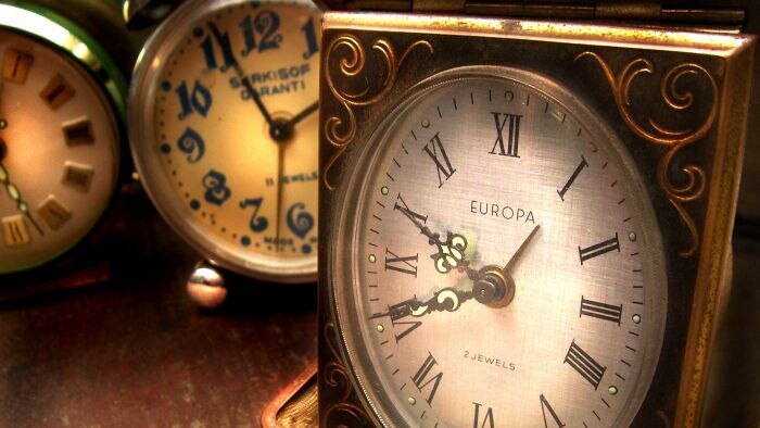 A collection of antique clocks.