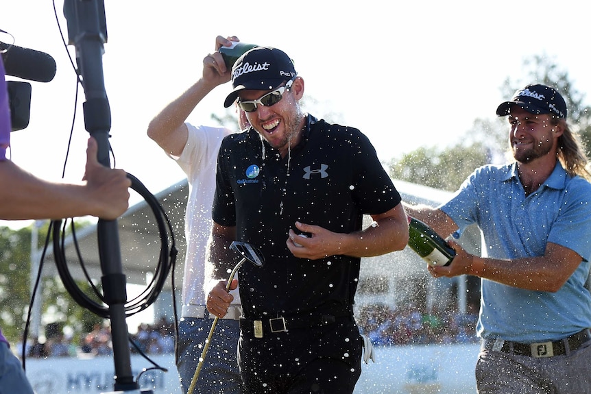 Nathan Holman celebrates his Australian PGA Championship win