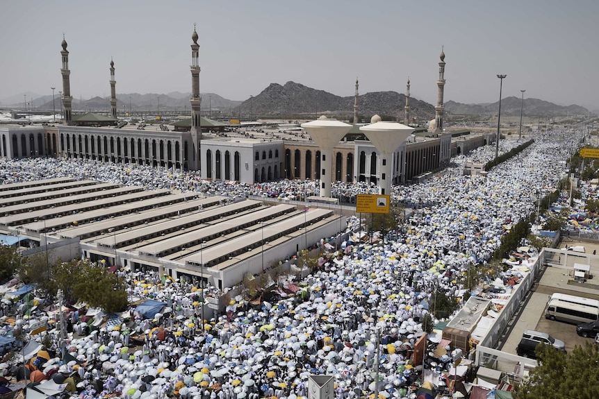 Muslim pilgrims gather to perform noon and afternoon prayers at Namira Mosque in Mount Arafat, southeast of the Saudi holy city of Mecca