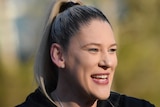 A retired Australian female basketballer speaks to the media in Canberra in 2019.