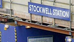 Standing guard: Police have shot dead a man inside Stockwell Station.