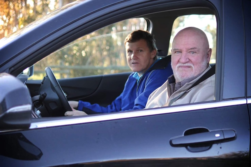 Brendan Smith and Trevor Eberle in car