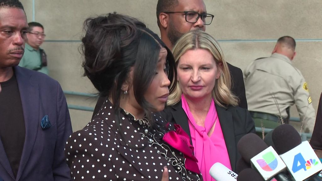 Cardi B speaks to reporters. 