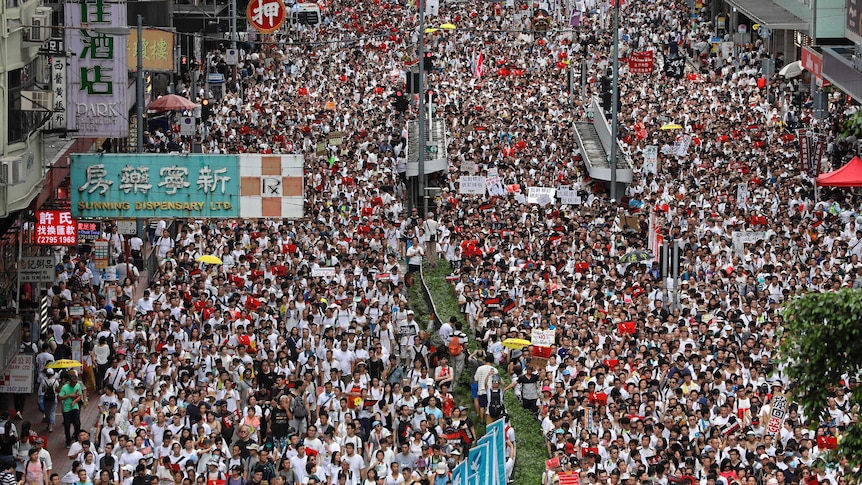 protesters march in Hong Kong
