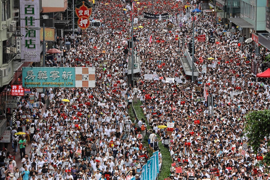 protesters march in Hong Kong