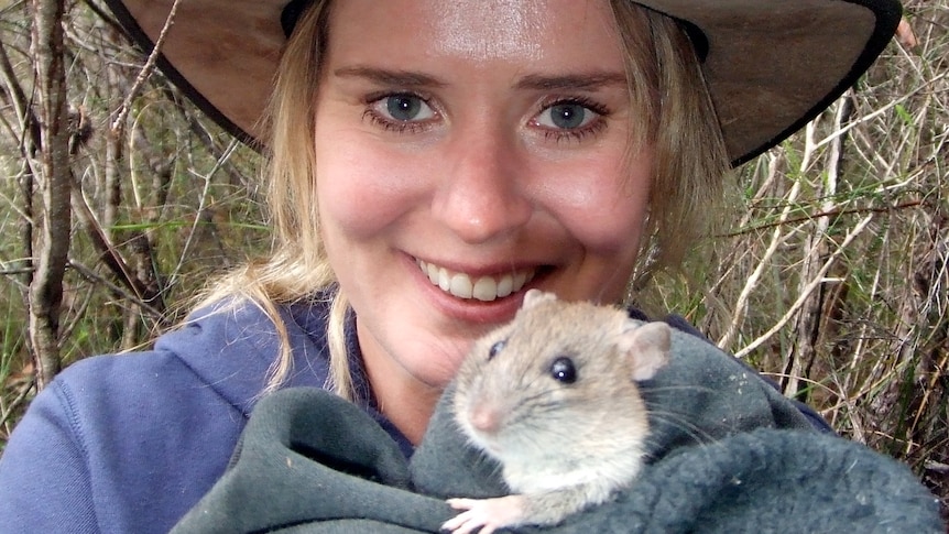 Ecologist Grainne Cleary with a bogul rat