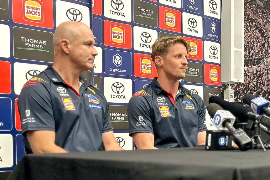Adelaide Crows coach Matthew Nicks and former captain Rory Sloane.